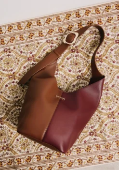 BOLSO MAXI BUCKET MARRÓN Y MORADO