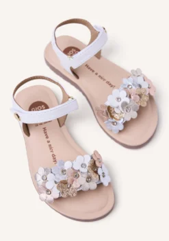 SANDALIAS PIEL FLORES GRADINA