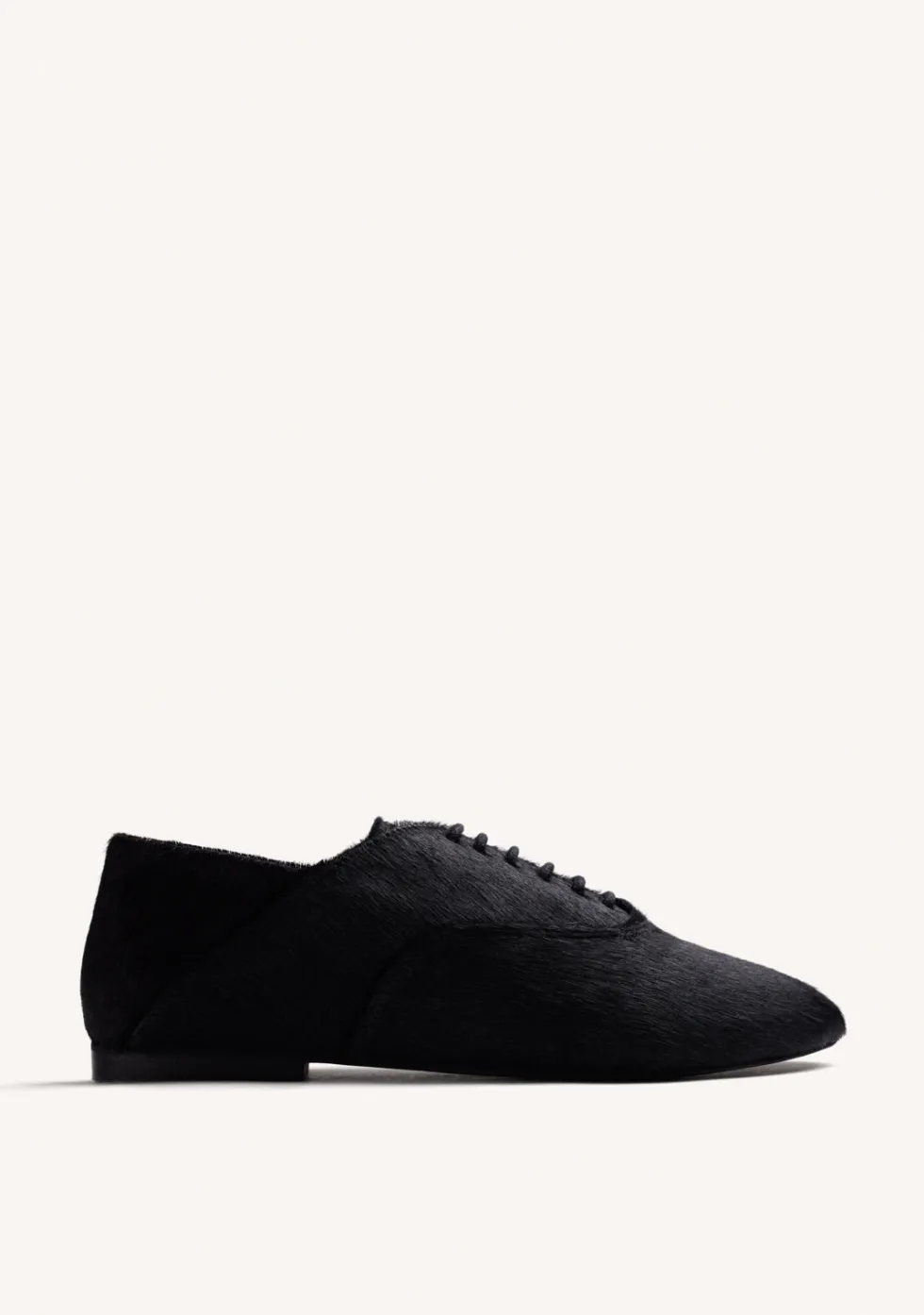 ZAPATOS PLANOS NEGROS PIEL
